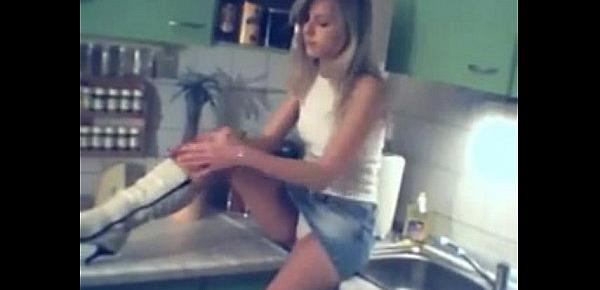  Hotwife blonde plays around in the kitchen